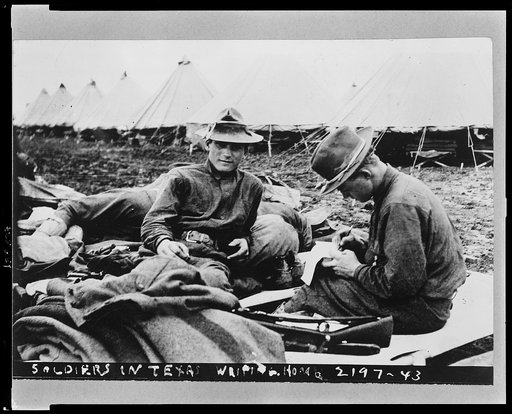 Soldiers in Texas writing home. Apr. 24, 1914