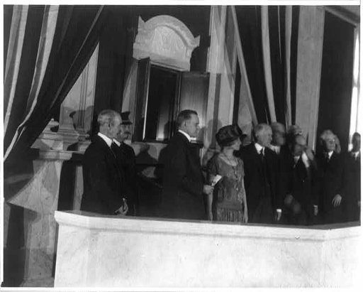 President Calvin Coolidge and his wife Grace Goodhue Coolidge at the dedication of the "shrine" for public display of the Declaration of Independence and the Constitution in the Great Hall of the Library of Congress. Herbert Putnam, Librarian of Congress, is on the left