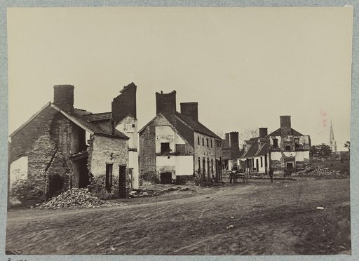 Street in Fredericksburg, Va., showing houses destroyed by bombardment in December, 1862