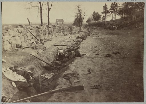 Stone wall at foot of Marye's Heights, Fredericksburg, Va. at the front carried by 6th Maine Infantry, May 3, 1863. Photographed twenty minutes after storming party had [...] up the hill