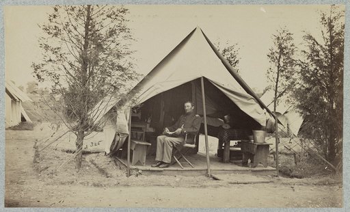 Soldier sitting inside his tent