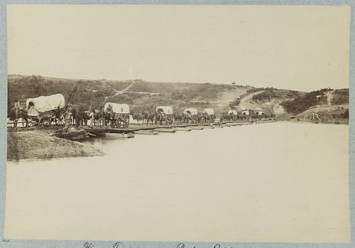 Wagon train crossing pontoon bridge, Rappahannock River, below Fredericksburg, Va.