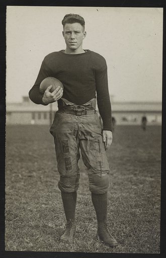 Hamilton, halfback on the football team at U.S. Naval Academy, Annapolis, Maryland