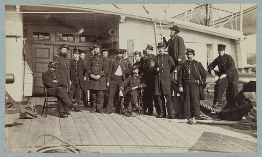 Navy crewmen on the deck of a ship