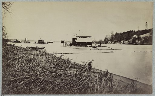 Fleet of monitors in Trent's Reach, James River, Va. Butler's "Crow's Nest" signal tower on bank of river