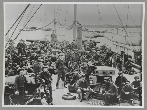 (Sailors on deck of warship)