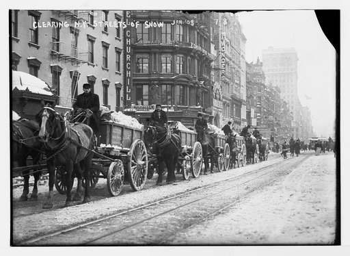 Cleaning snow from the streets in trucks, New York