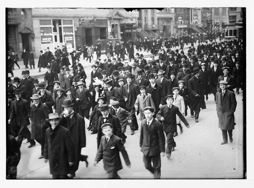Crowd following suffragettes, New York