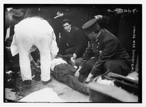 Police work over Silverstein at anarchist riot, Union Square, New York