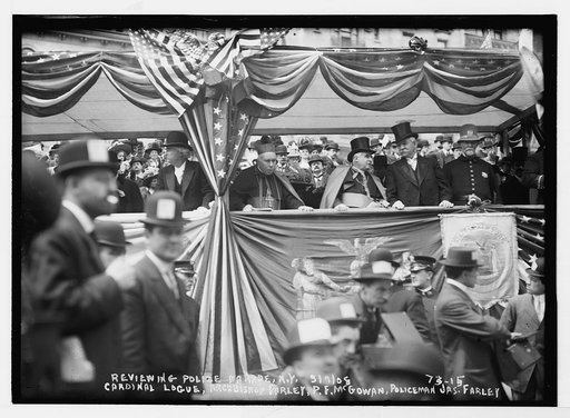 Reviewing police parade: Cardinal Logue, Archbishop Farley, P.F. McGowan, policeman Jas. Farley, New York