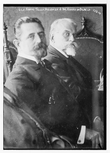 Gen. Ramon Tello Mendoza and Dr. Eduardo Blanco, seated