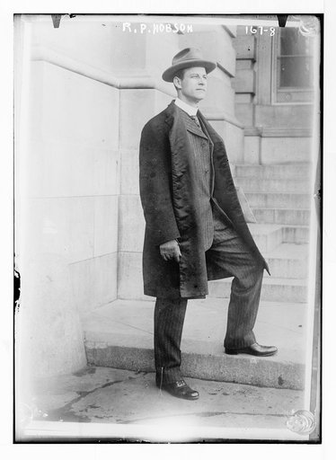 R.P. Hobson, standing