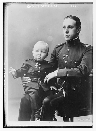 King with his son on his lap
