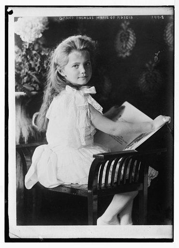 Grand Duchess Marie, seated with book