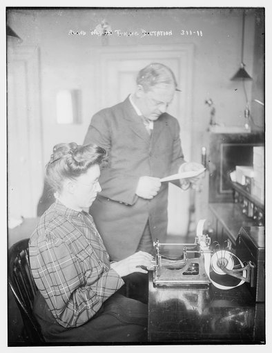 Blind women taking dictation on machine