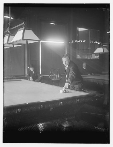 C. Demarest shooting pool
