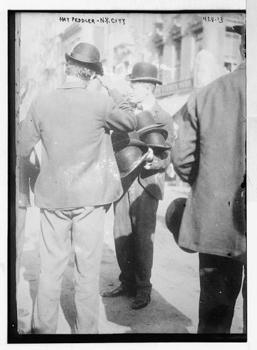 Hat Peddler on sidewalk, New York