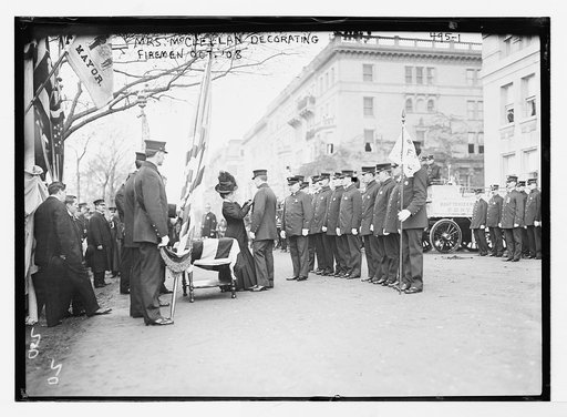 Mrs. McClellan decorating firemen [New York City