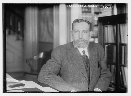 Francisco J. Yanes [seated at desk