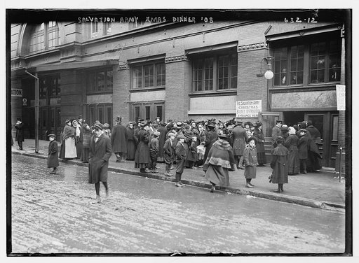 Salvation Army Christmas dinner, crowd waiting at basket distribution window, New York