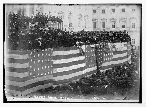 Hayes inauguration - flag bedecked podium and crowd