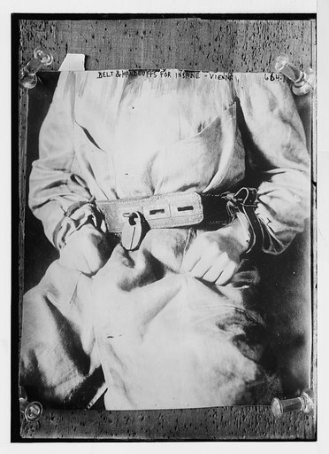 Belt and handcuffs on insane person, "Fools Tower", Vienna