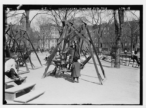Children in playground swings, Hamilton Fish Park, New York