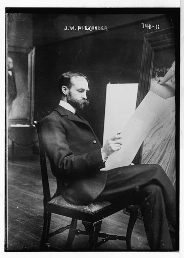 J.W. Alexander, seated in picture gallery