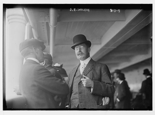 J.E. Wilkie, on boat