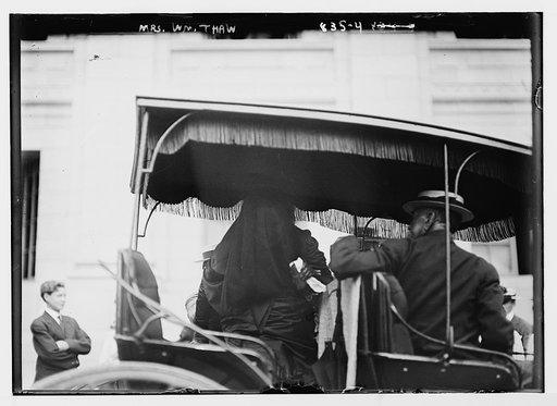 Mrs. Wm. Thaw, veiled, in carriage with gentleman, New York