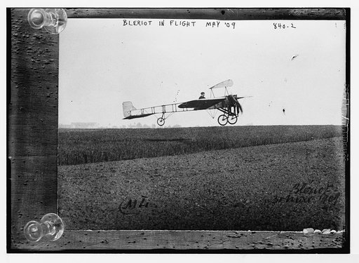 Bleriot, in flight over field