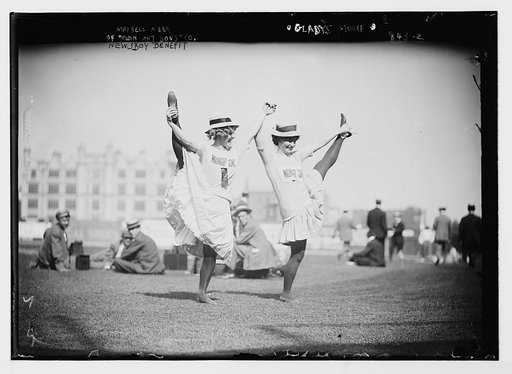 Maybell Meek and Gladys Moore of "Midnight Sons", posing together on ball field during newsboys benefit