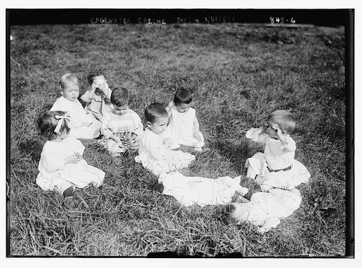 Small children on grass, Edgewater-Creche, Bryson Nursery