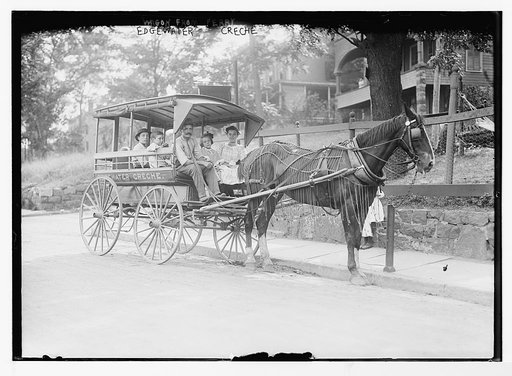 Children in wagon from ferry, Edgewater-Creche, Bryson Nursery