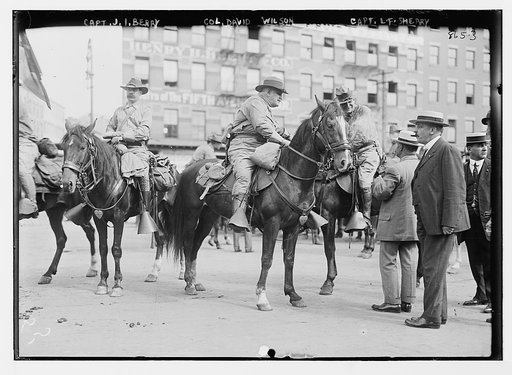 Capt. J.I. Berry, Col. David Wilson, and Capt. L.F. Sherry, astride horses, part of 1st Battery, U.S. Army, in New York