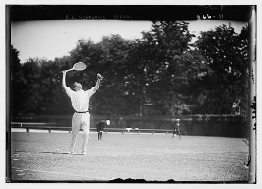 A.E. Neargaard, playing tennis