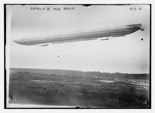 Zeppelin III in flight over field, Berlin
