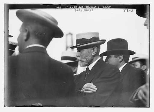 Alex. Miller, Harriman's secretary, with others