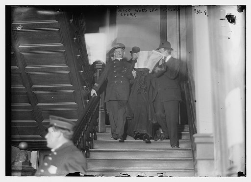 Miss Ward Law leaving court escorted by policeman and others