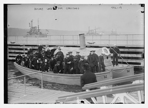 Sailors in boat coming in for Xmas leave