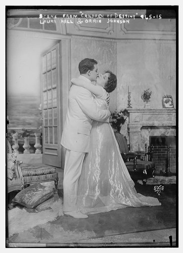 Laura Hall and Orrin Johnson embracing, scene form Children of Destiny, White N.Y. Photo