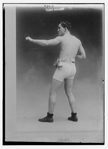 Tommy Murphy in athletic trunks