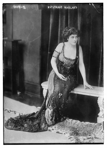 Katherine Kaelred seated on bench, Moffett Photo.