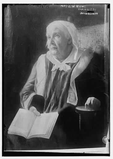 Mrs. H.W. Howe with book, co. John Elliott