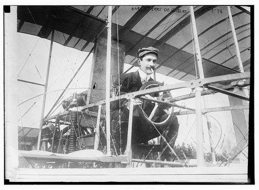 Baron Pierre de Gaters at wheel of aeroplane