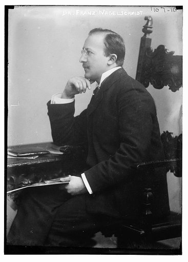 Dr. Franz Nagelschmidt seated at desk