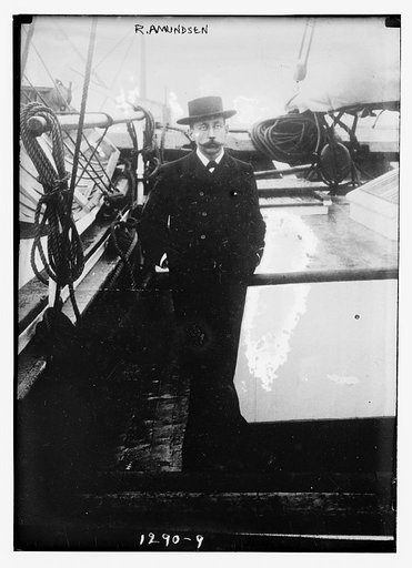 R. Amundsen standing on a ship