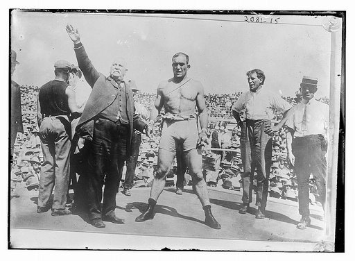 Boxer and announcer in boxing ring