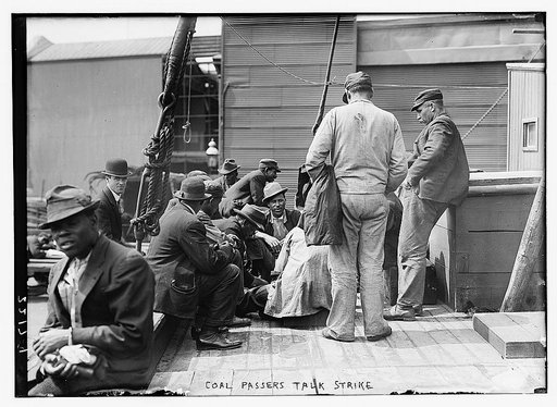 Coal Passers Talk Strike (group on ship's deck)