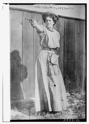 Mrs. Adolph Topperwein. [with gun